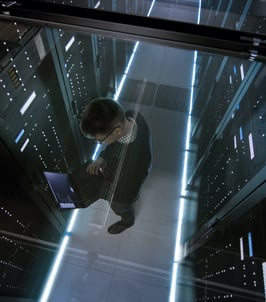 IronNet Man managing server room