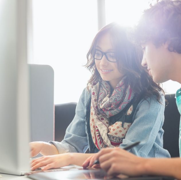 IronNet-Internship-Female intern on computer@2x